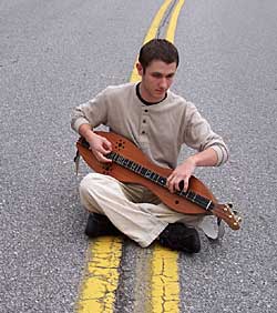 Aaron with his Custom Walnut/Redwood A3-AE Dulcimer